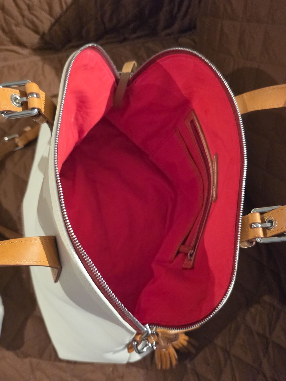 Gorgeous Dooney & Bourke White Tote with Tan Handles and Red Interior.